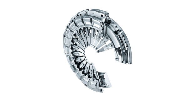 Travel adjusted clutch (TAC)